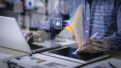 Man using tablet and laptop at a desk with an digital AI overlay