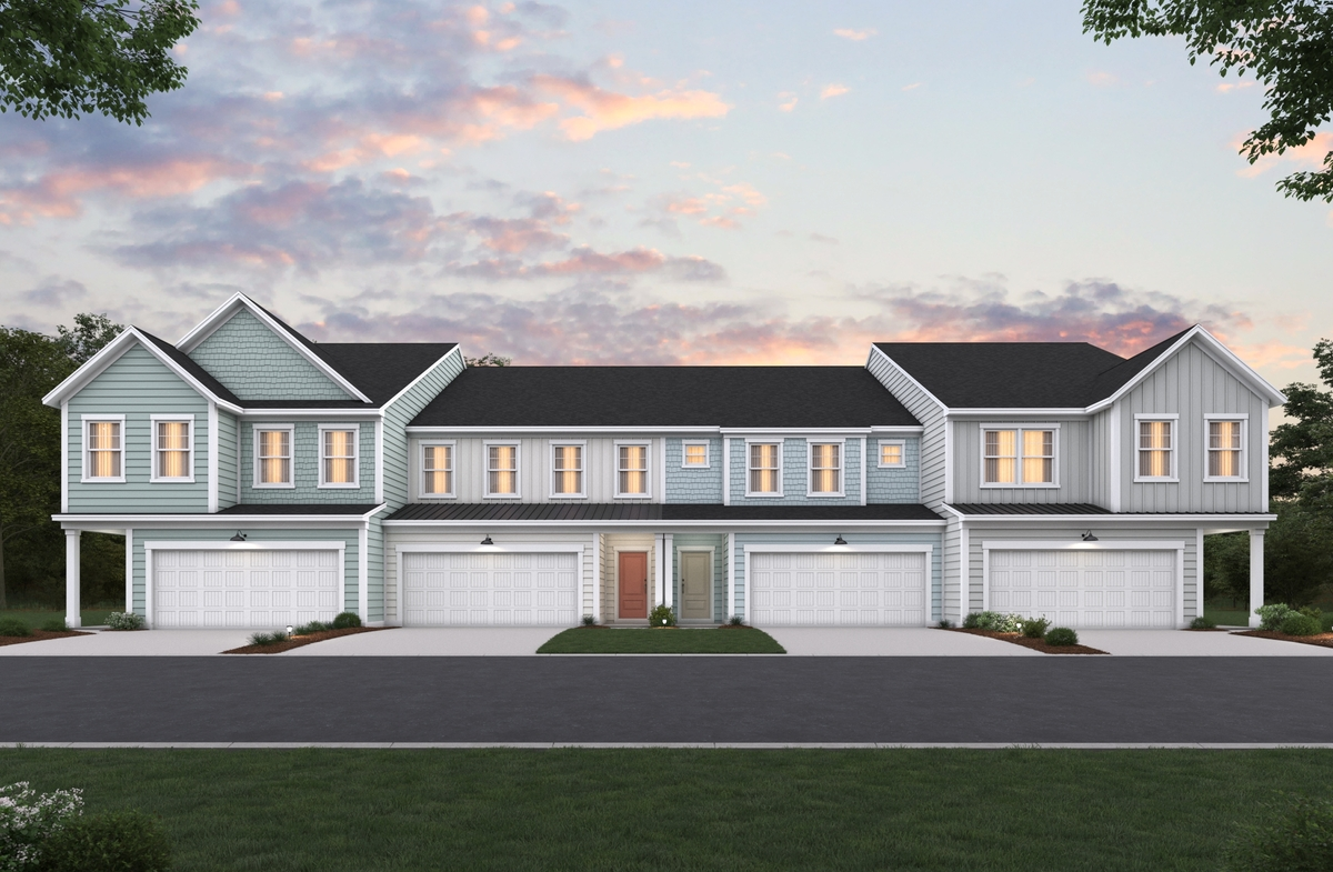 exterior 2-story townhomes with front-load garage