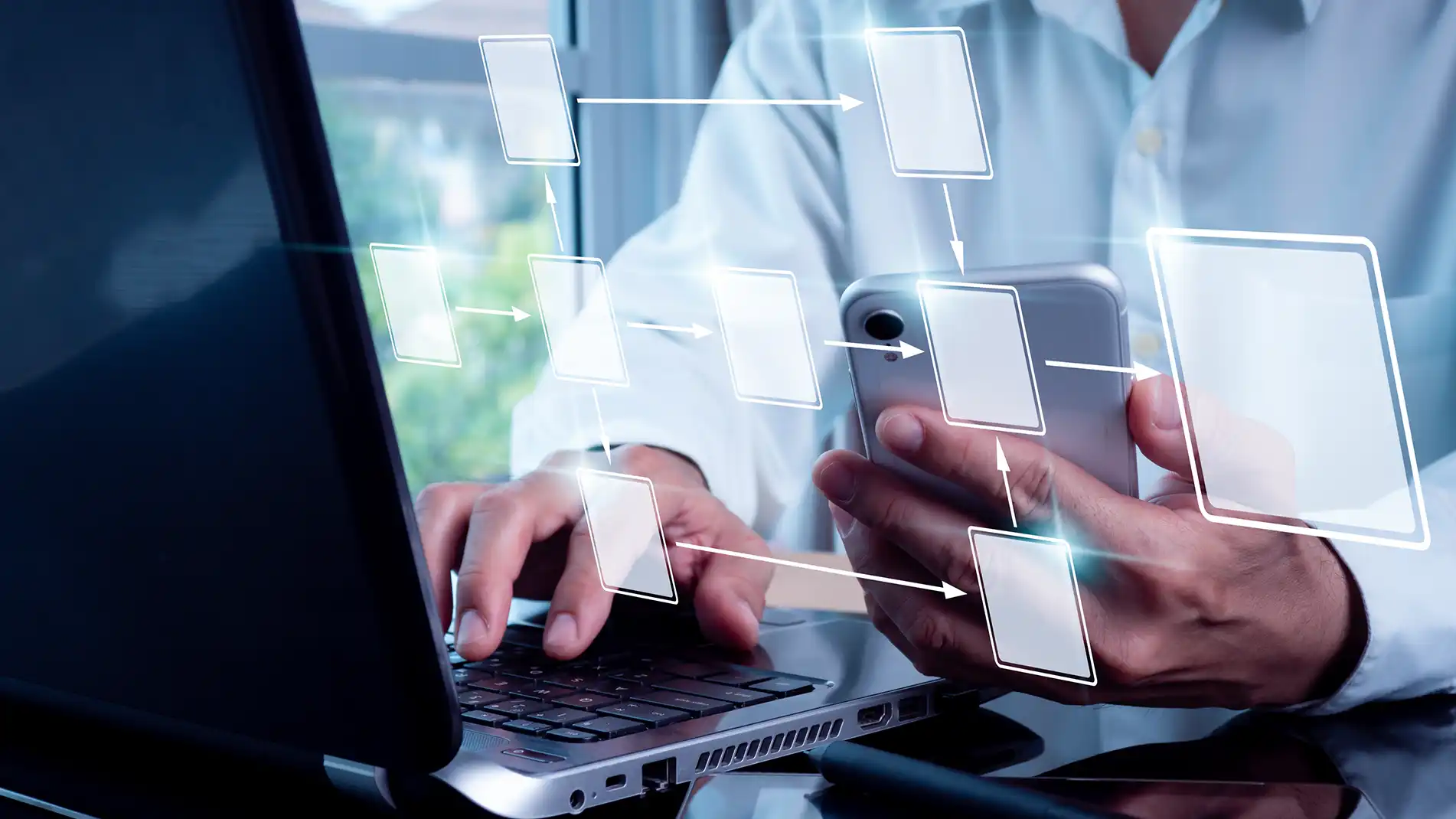 Automated-Order-Exception-Management-In-Page-3.webp Image of a person typing on a laptop computer.