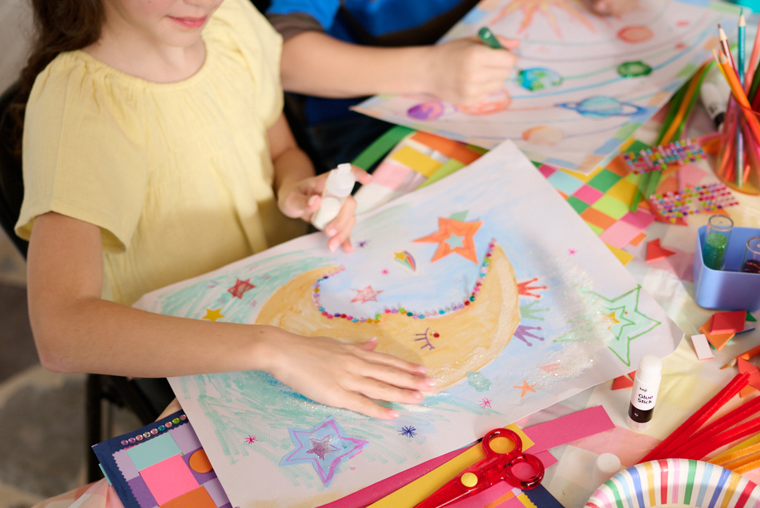 two kids colouring