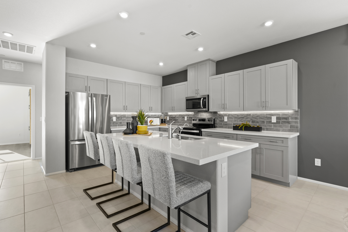 light filled kitchen with quartz countertops