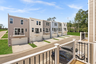 deck overlooking community and roadway