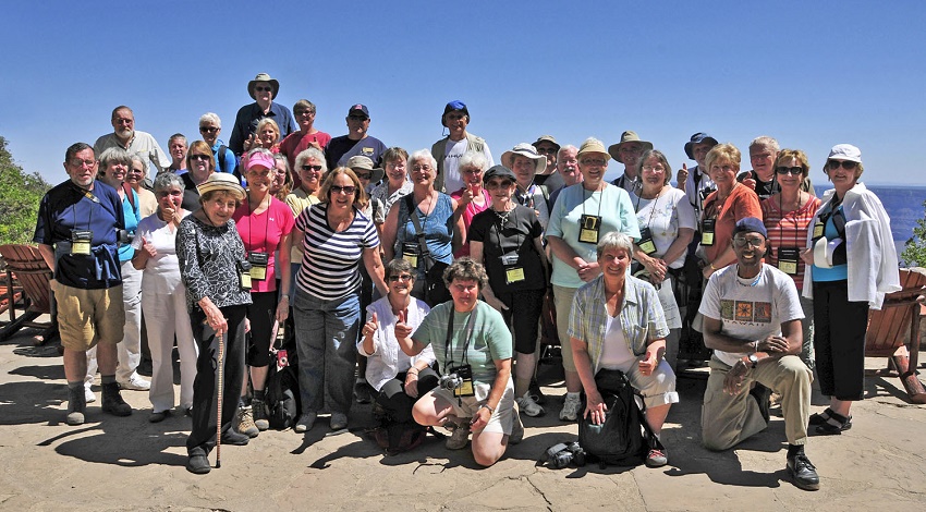Richard and his Road Scholar group smile together for a group photo