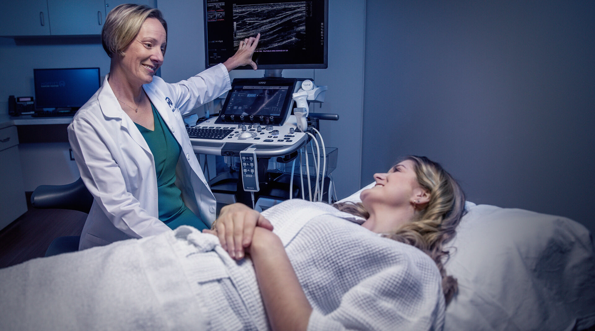 Dr. Bethany Niell points screen to show breast radiology