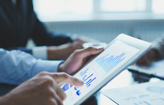Close-up of iPad with analytics dashboard