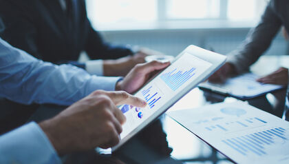 Close-up of iPad with analytics dashboard