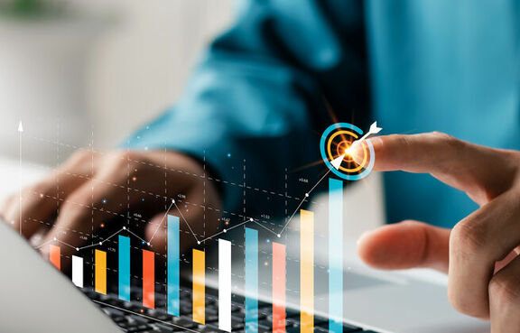 Business man looking at a laptop 