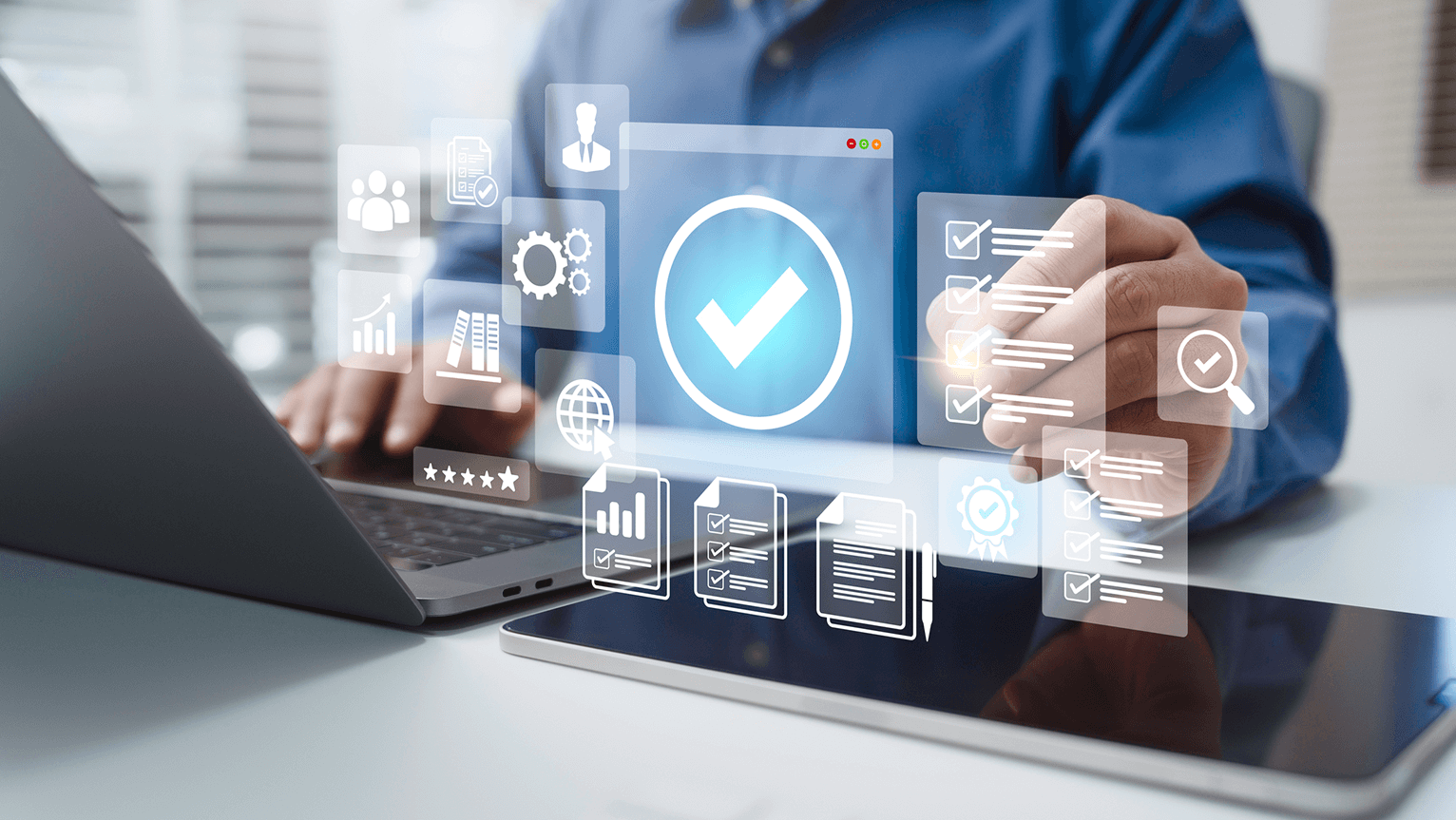 Image of a man and laptop computer with abstract data.