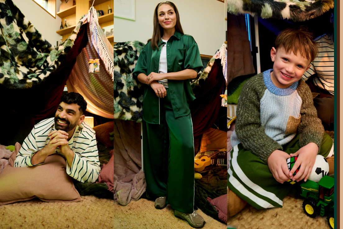 A warm, family-oriented lifestyle fashion campaign set inside a cozy indoor blanket fort. The image combines three scenes featuring a relaxed man in striped loungewear, a woman in an elegant green coordinated set, and a smiling child playing with toys. Soft lighting, layered blankets, earthy textures, and playful fort details create a comfortable, intimate atmosphere that blends comfort, style, and togetherness.