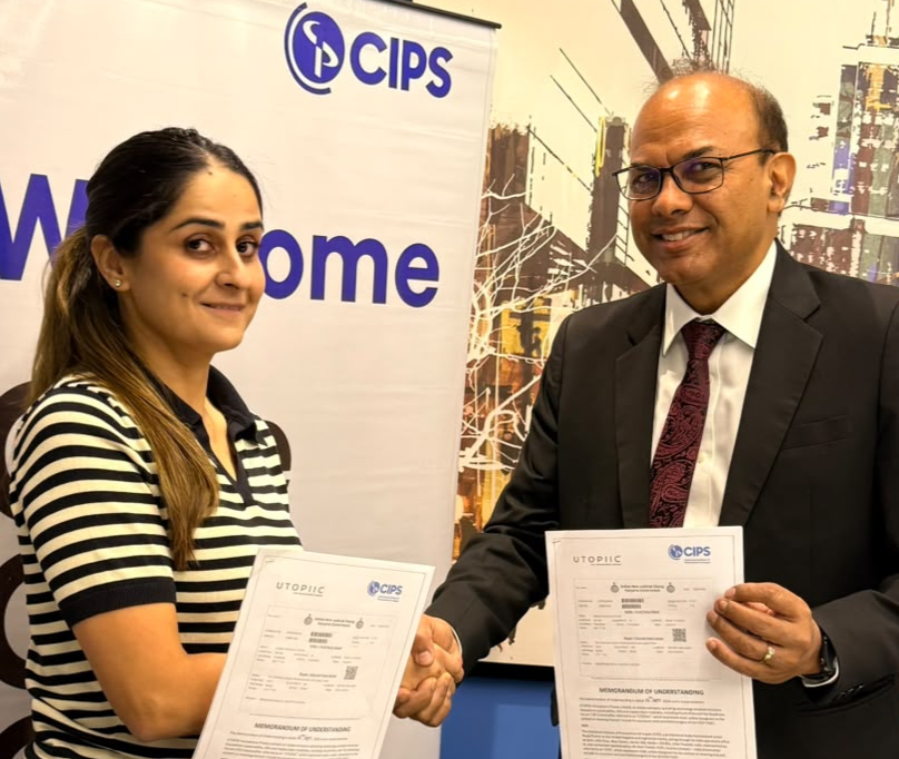 Woman and man shaking hands with signed document