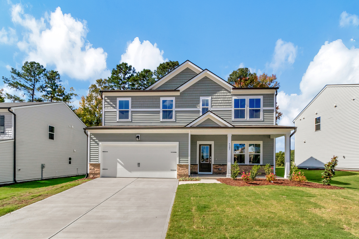 two-story single-family home with vinyl siding