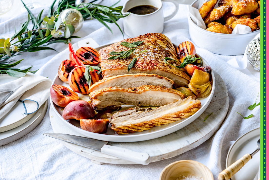crispy pork belly with chargrilled summer stone fruits table setting