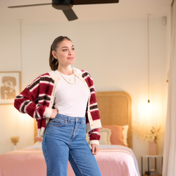 Lady wearing denim jeans and burgundy striped Winter Cardigan