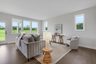 great room with hard surface flooring and windows