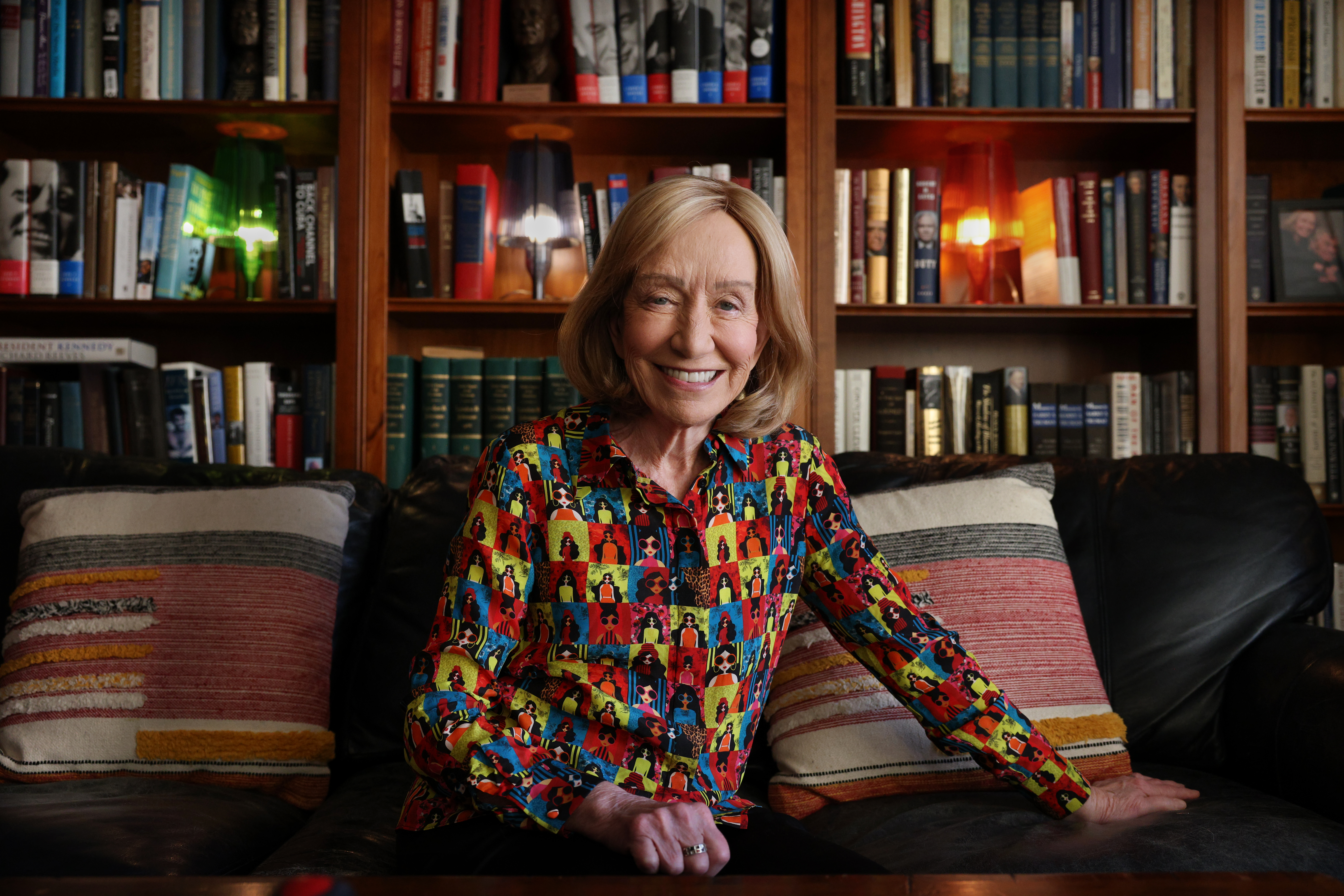 A photo of Doris Kearns Goodwin in front of a book case