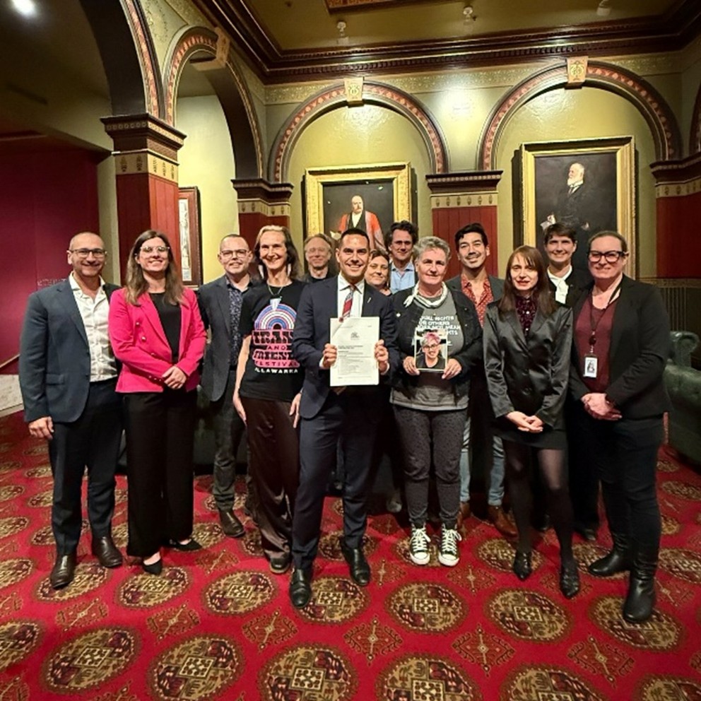 Dr Kate Toyer with Independent Member for Sydney Alex Greenwich and supporters of the new legislation at NSW Parliament House.jpg