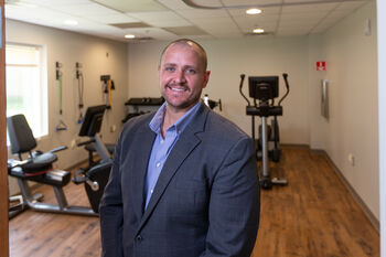 Image of Dr. Nate Parker standing in Moffitt's exercise lab