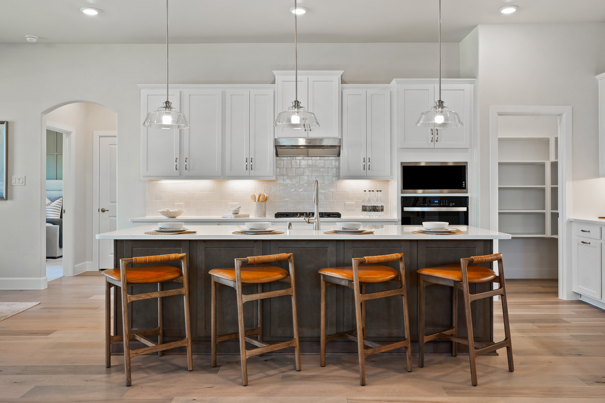 open kitchen with large island and cabinet space