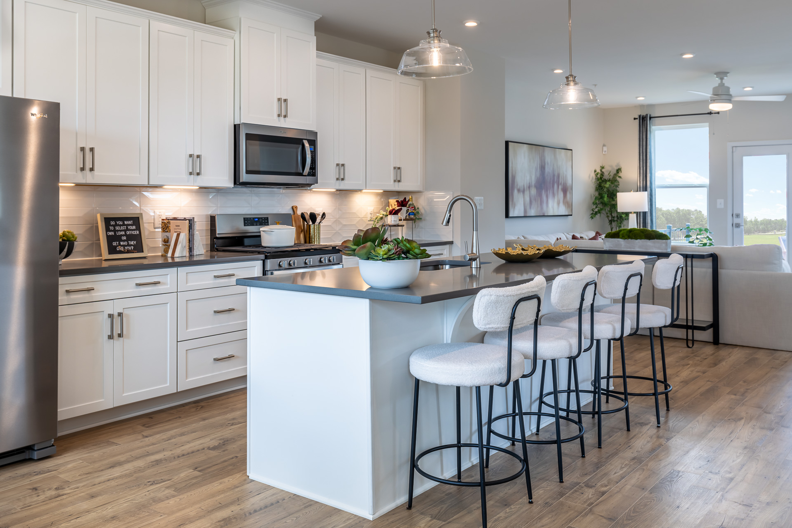 kitchen with white cabinets & granite countertops