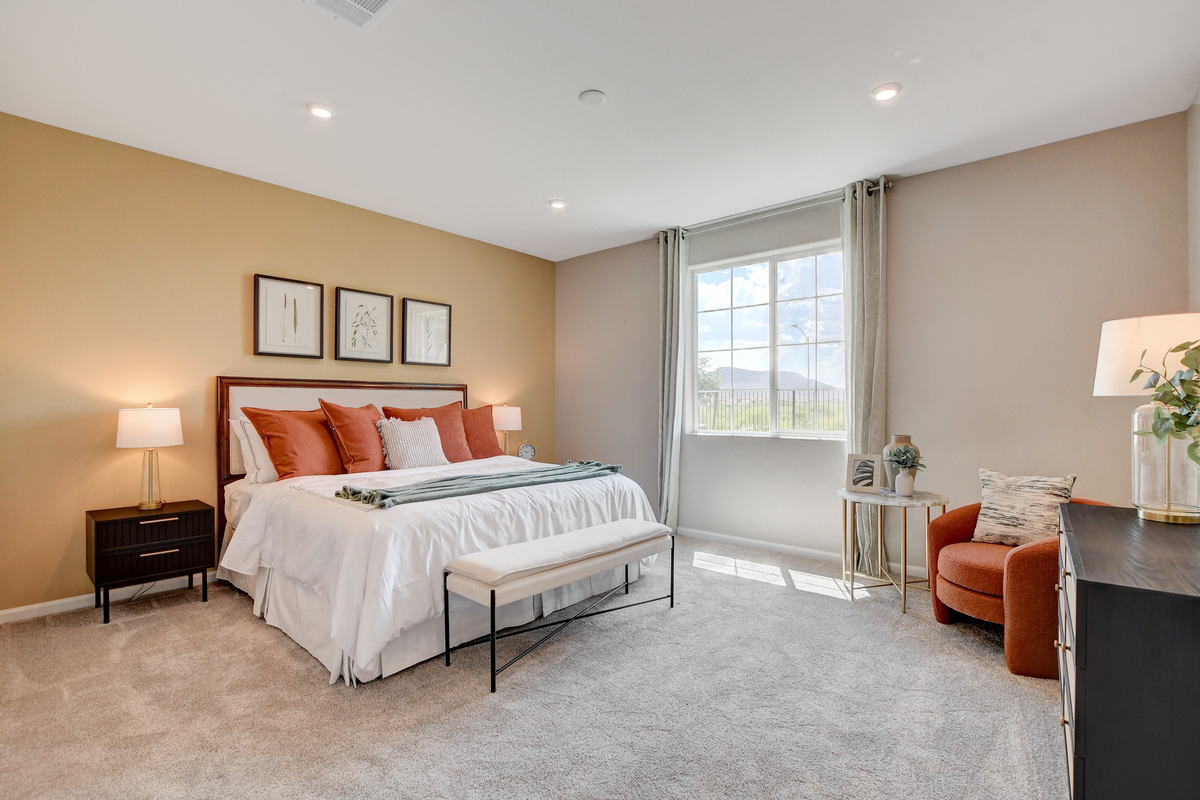 bedroom with large window and bed