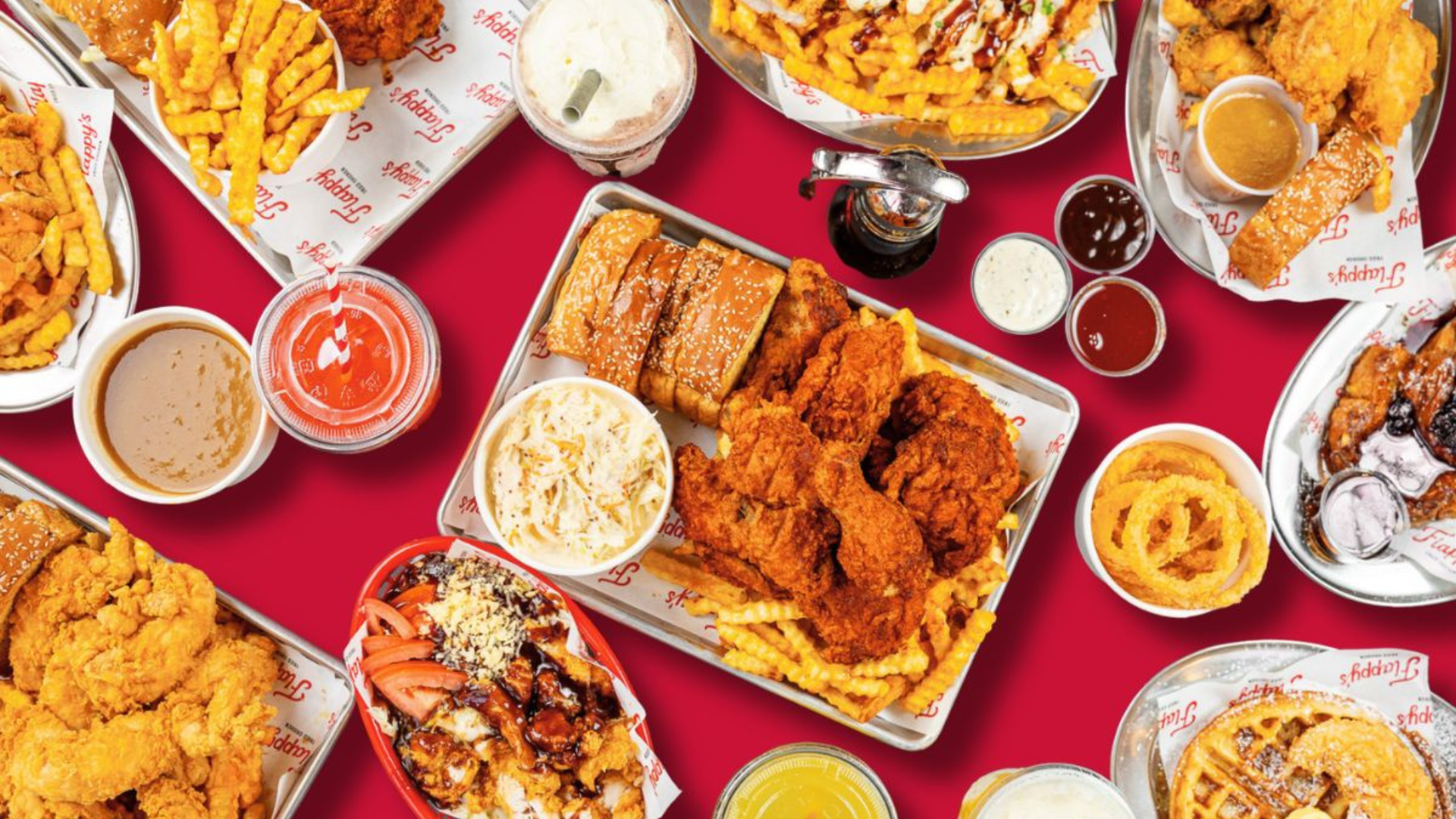 Flappy's Fried Chicken meals laid out on a red table