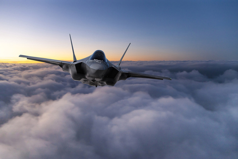 Jet above the clouds