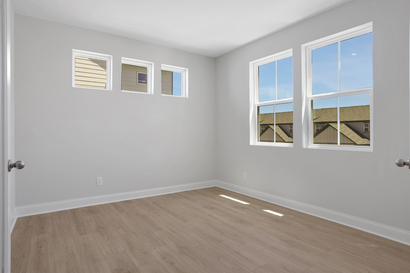 study with french doors and hard surface flooring