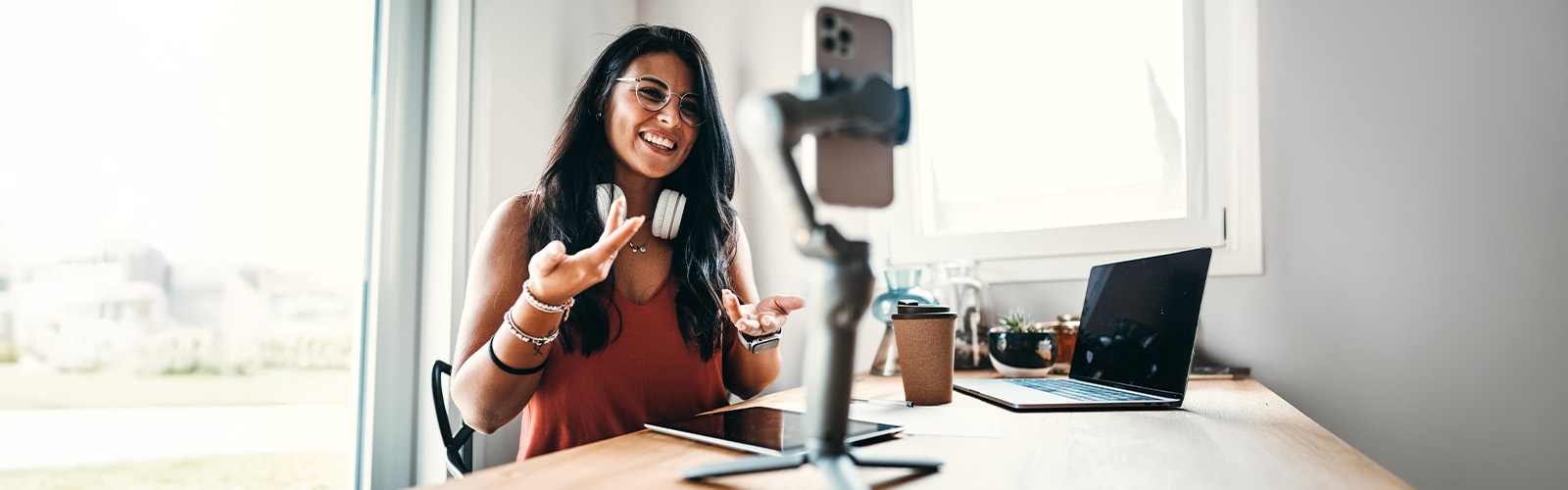 A woman livestreaming on social media