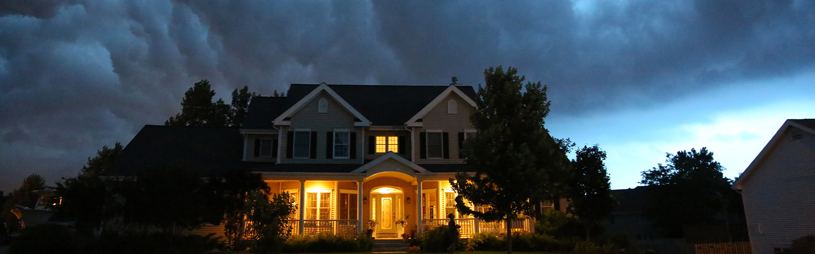 A home with storm clouds above it