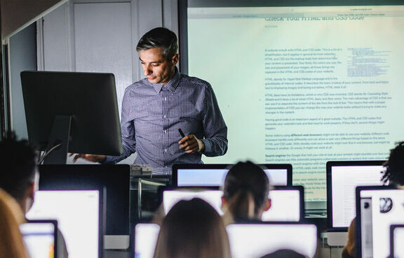 College professor and students in lecture