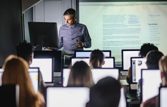 College professor and students in lecture