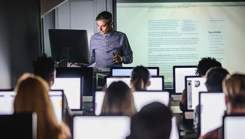 College professor and students in lecture