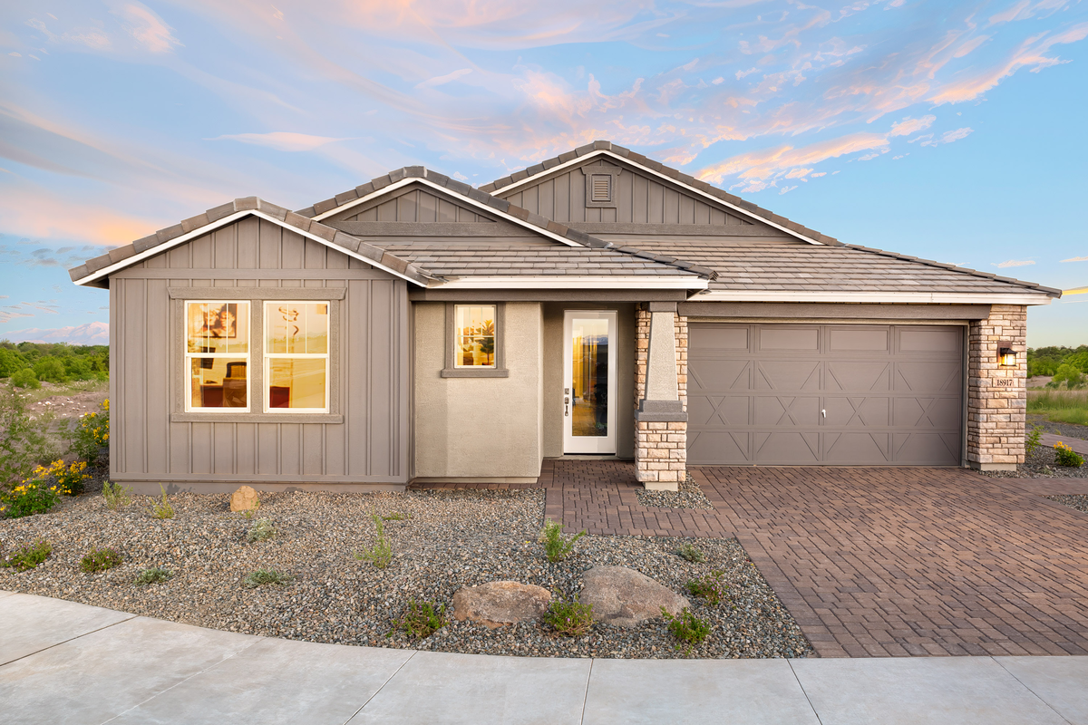 outdoor view of home with desert landscape