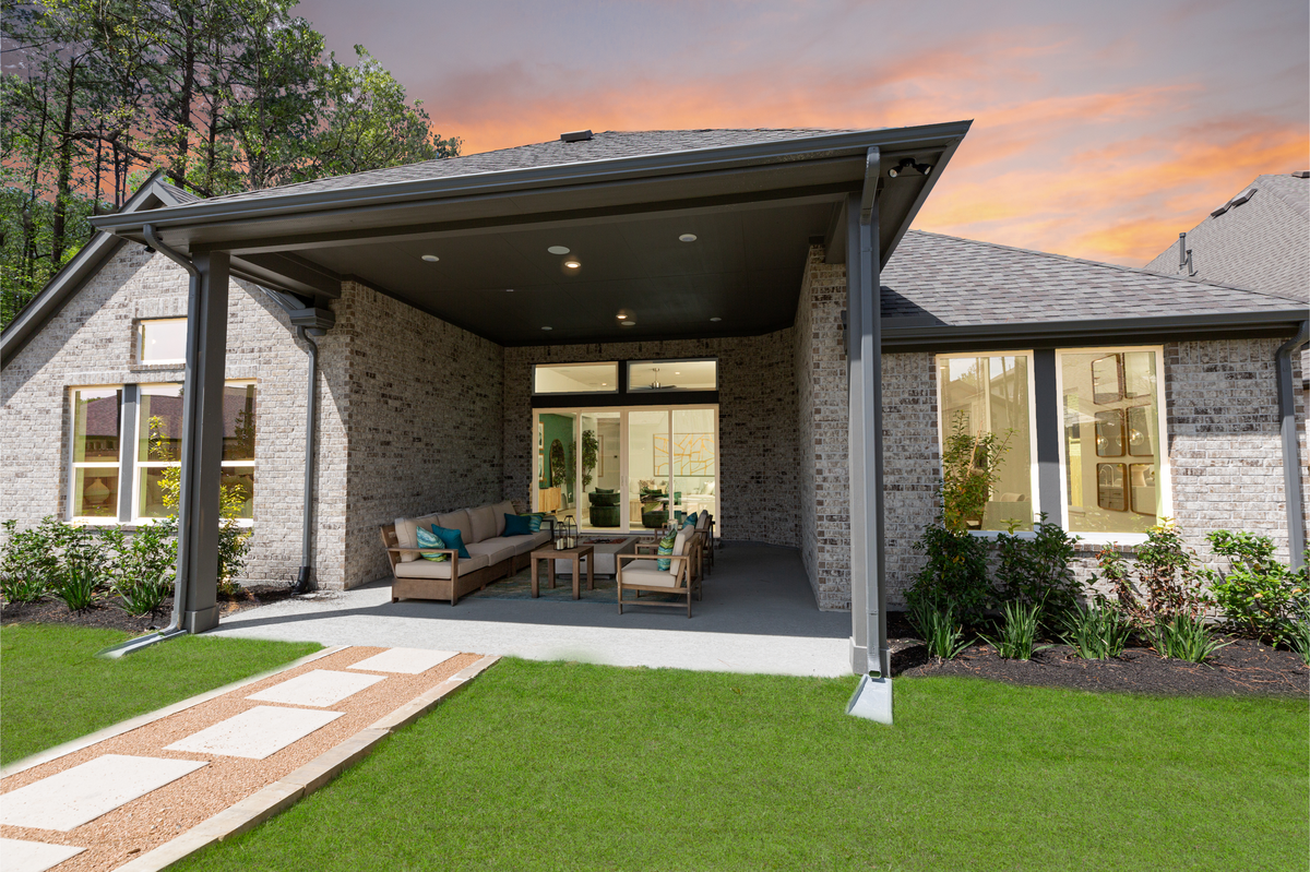 home exterior rear with covered patio and seating