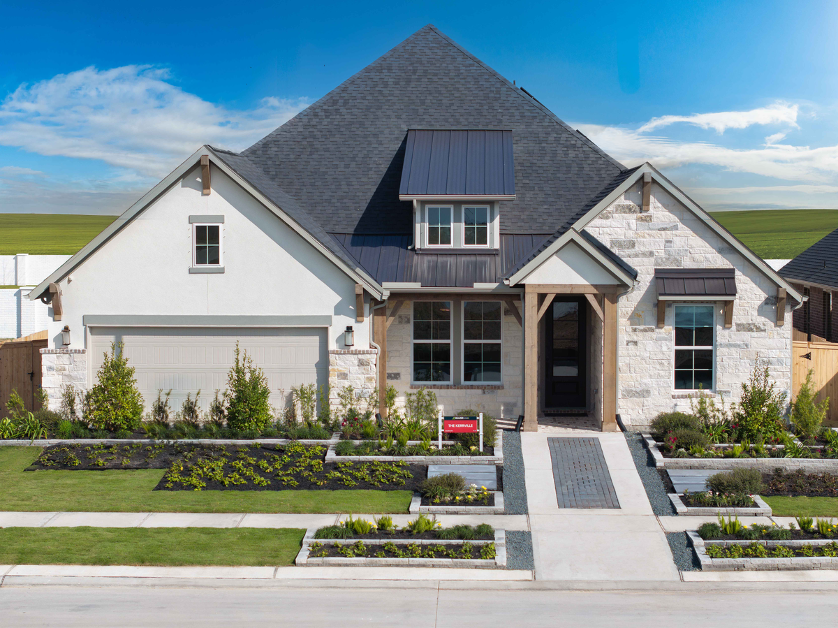 exterior stone home with wood accents
