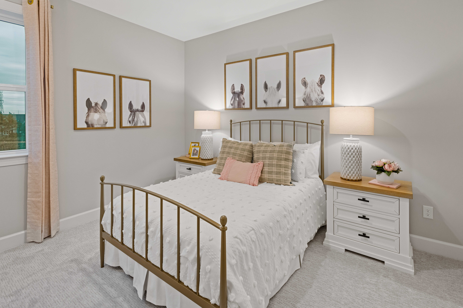secondary bedroom with large windows and carpet