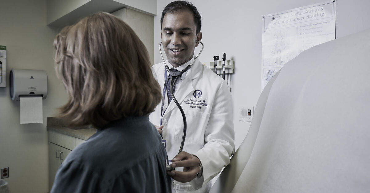 Dr. Kedar Kirtane with patient