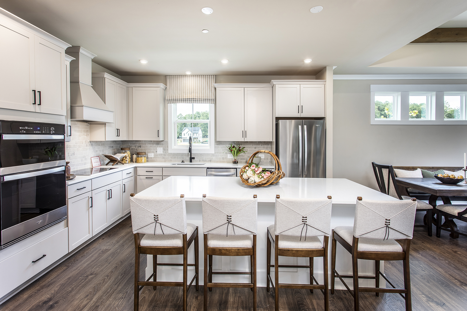 kitchen with center island and white cabinets