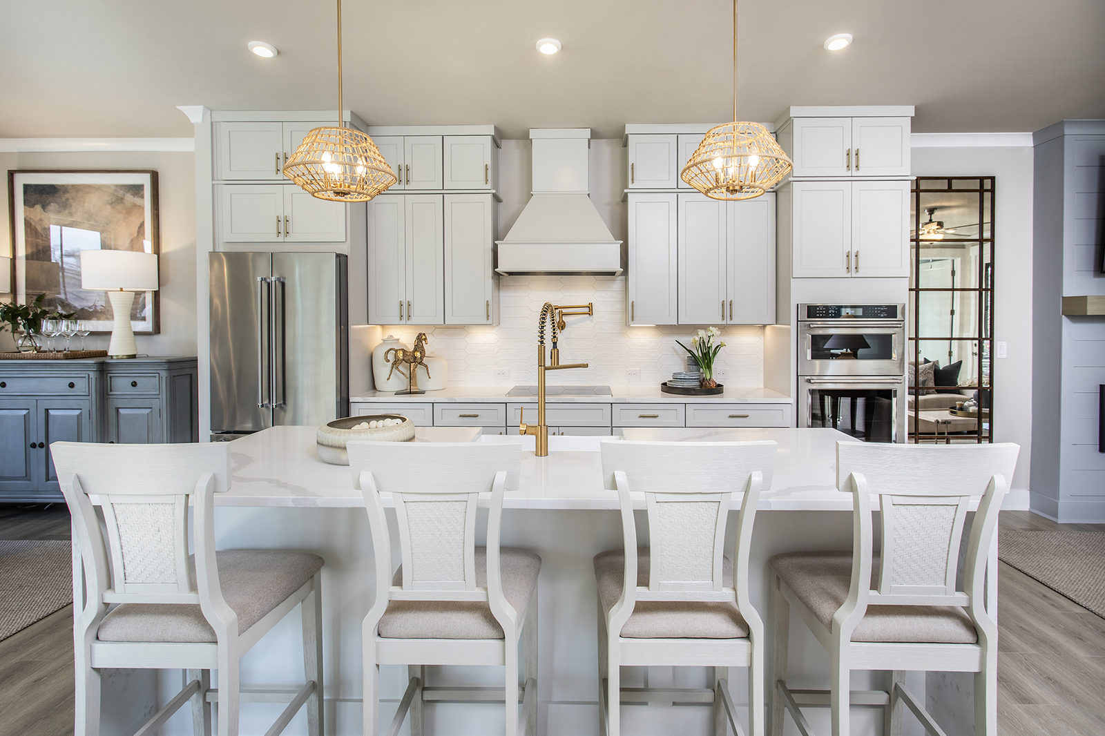 kitchen with white cabinets and gold hardware