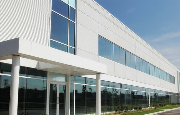 Modern business building with empty parking lot