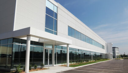Modern business building with empty parking lot