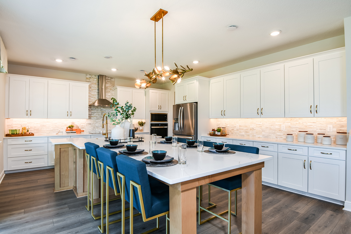 kitchen with oversized island and six chairs