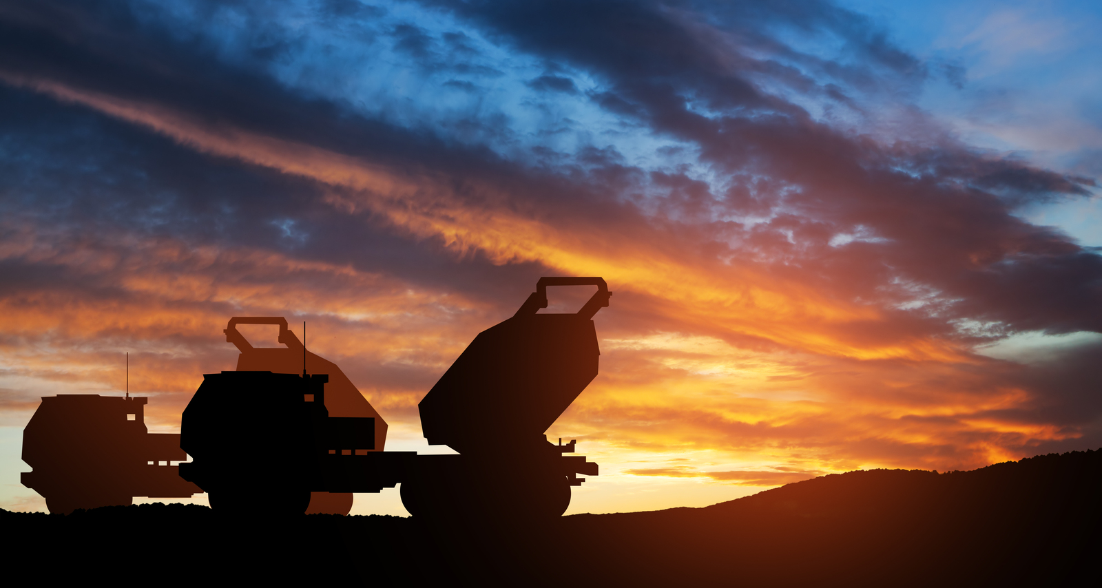 Servers at a data center with blue lighting
