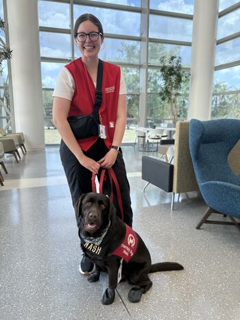 Mackenzie Nalven and Nash are volunteers for the Pet Therapy Program.