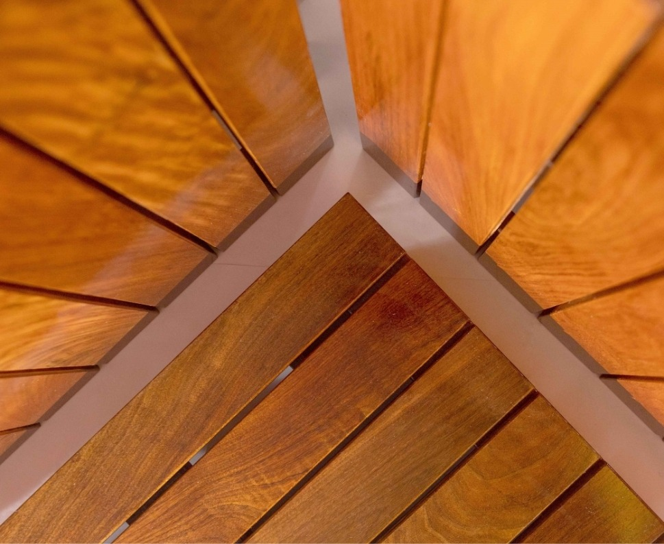 Maximo hardwood decking around a poolside exterior area
