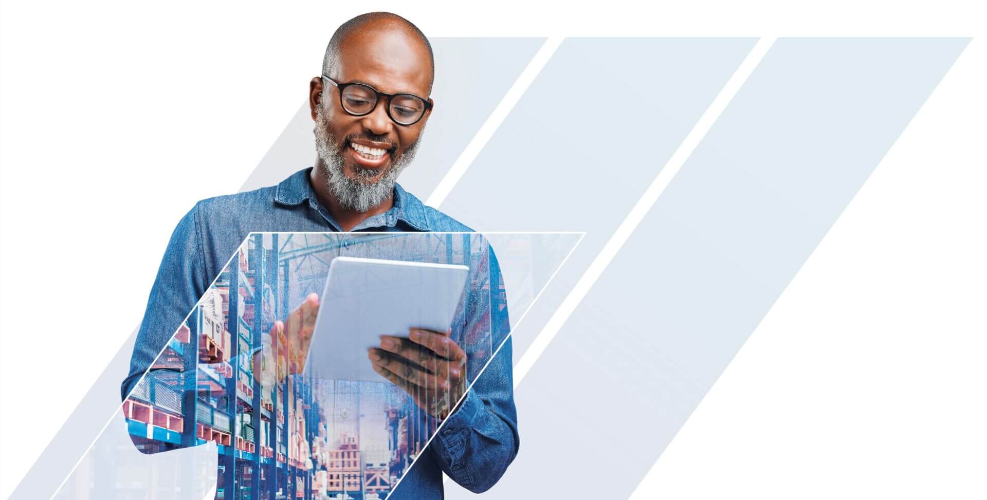 Man looking at a tablet.