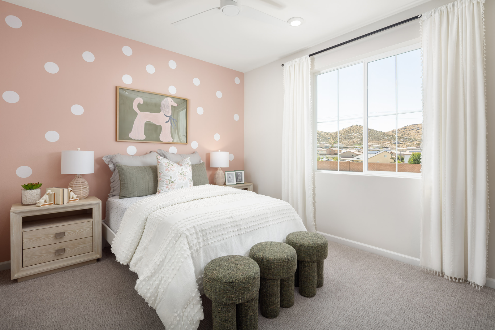 bedroom with neutral floors and accent wall
