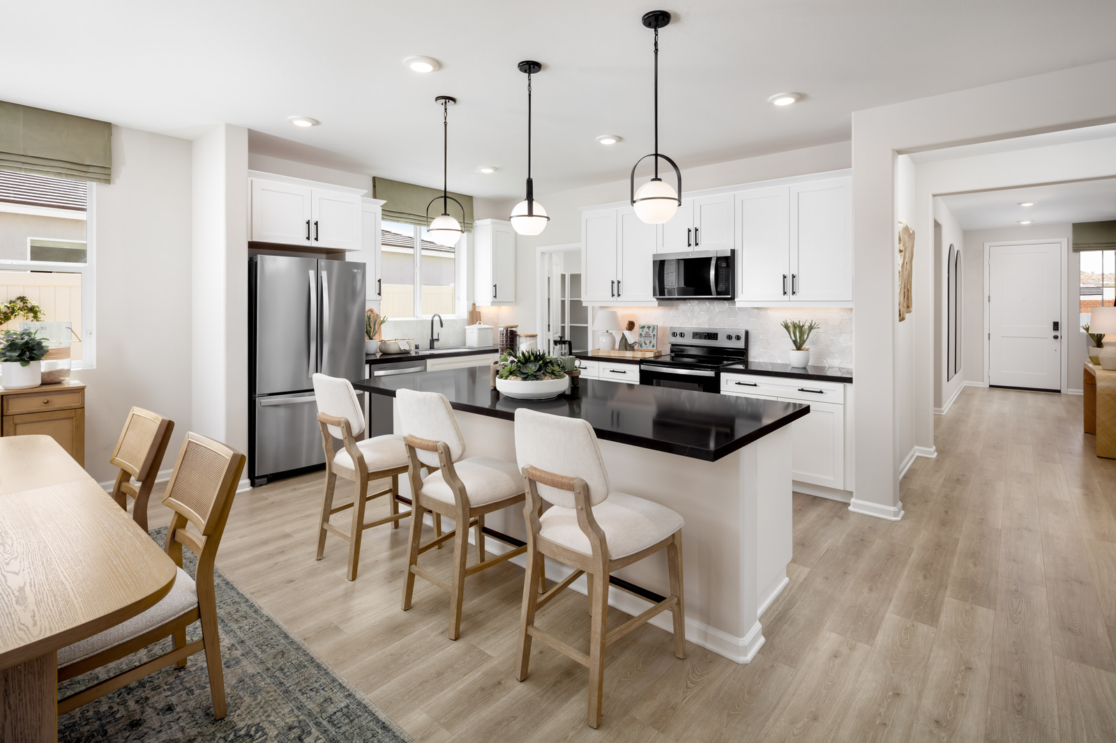kitchen with neutral floors and large island