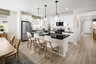 kitchen with neutral floors and large island