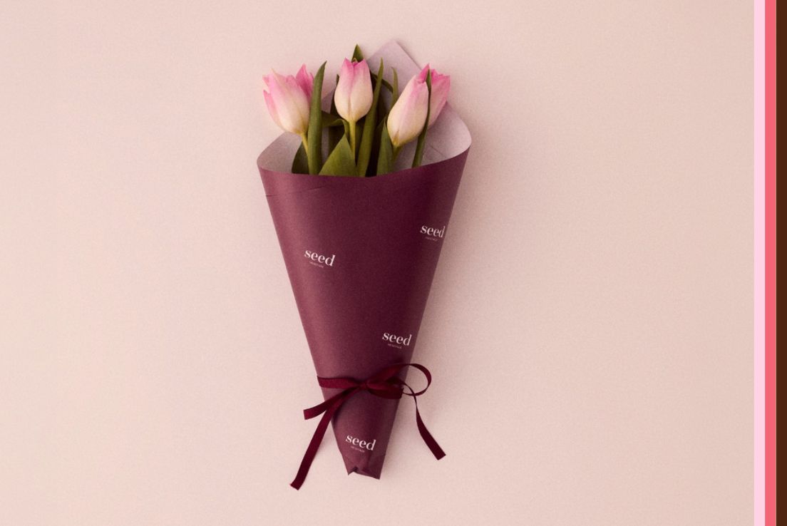 bouquet of flowers wrapped in seed heritage wrapping